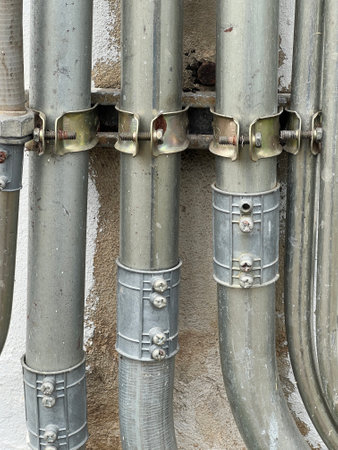 electric pipes on the old industrial wall