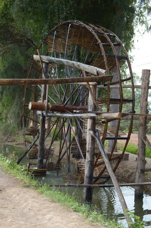 wheel of water made from bambooの写真素材
