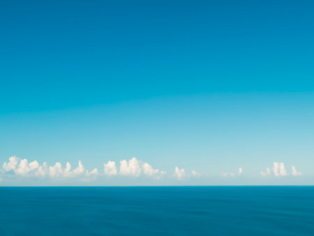 blue water surface and sea with white skyの素材