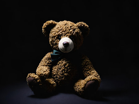 teddy bear on black backgroundの素材