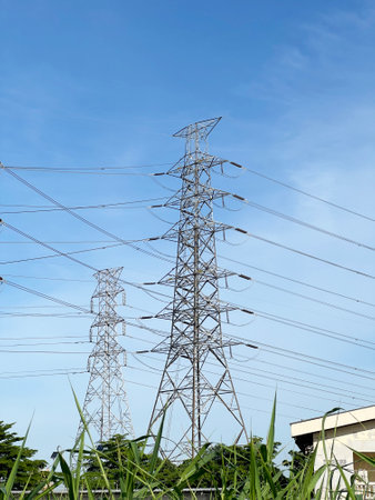 power line and electric pole on sky background with copy space