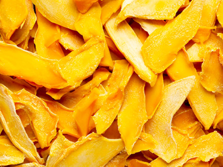 dried mango chips. close up.の素材