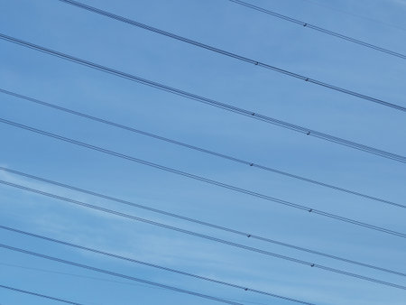 electricity pylon on blue sky background