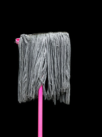 pink mop on a black background