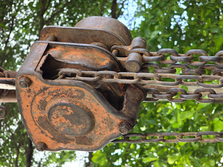old rusty iron chain and reel