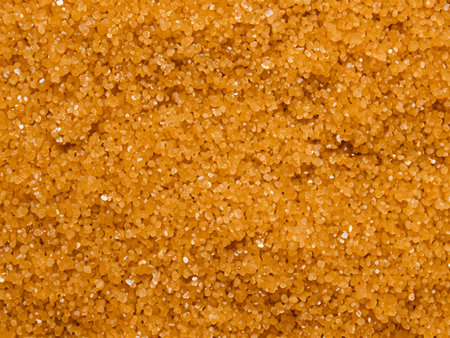 background of brown sugar. macro shot of sweet sugarの素材
