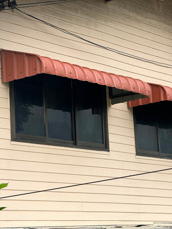 the facade of the house with windows
