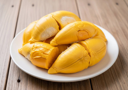 yellow durian on white dishの素材