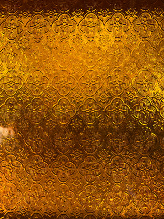 gold glass background with a gold pattern