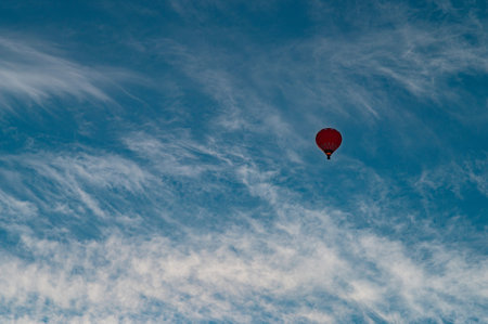 Colorful hot air balloon on blue sky backgroundの写真素材