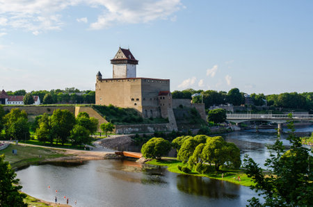 Narva fortress on the border of Estonia and Russia, unique view - the border of Europe and Asia, the border of European Union and Russian Federation, fortresses on the bank of the river Narova.の写真素材