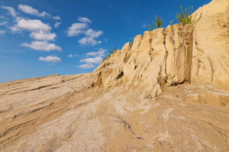 Sand Cliffs. Rummu quarry in Estonia near Tallinn. Desert. Sand surface after Rain. August 2024の写真素材
