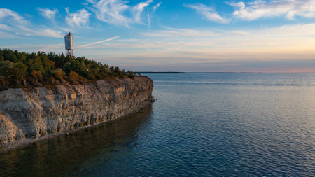 Aerial view over the Baltic sea. The Panga cliff in Saaremaa, Estonia during sunny evening. the highest bedrock outcrop in western Estonia. August 2024の写真素材