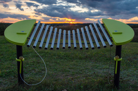 Playing Outdoor Xylophone During Sunset.の写真素材