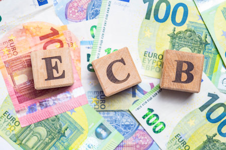 Real Estate. Euro. Interest rates. Inflation. Monetary Policy. Press Conference. Wooden cubes with...