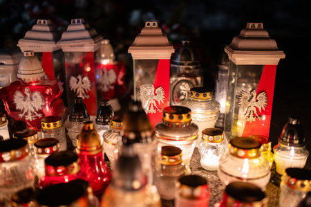 Candles, Red and White Flowers Garland. November 11. World War I Ends, Poland Independence Day, 1918...