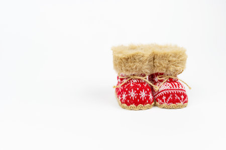Red Nicholas Christmas boots isolated on white background. Winter boots, snow boots. New Year....