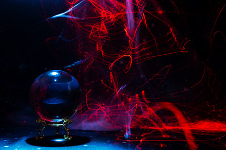 Abstract mystical scene featuring a crystal ball used in divination and future vision rituals,...