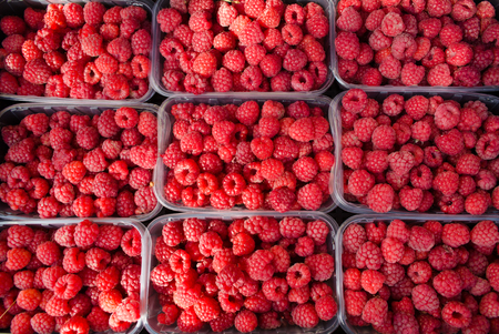 Fresh ripe raspberries as background