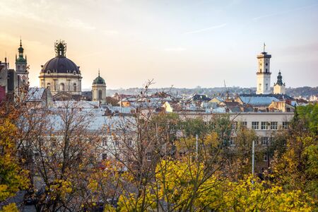 Lviv, Ukraine - October 18, 2019: Exterior view of historic Ukrainian city, Ratusha City Hall building and Dominican Church architecture in the moringのeditorial素材