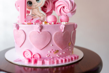 pink birthday cake. greeting card. Dessert for the holiday, marshmallows and gingerbread on a stick....