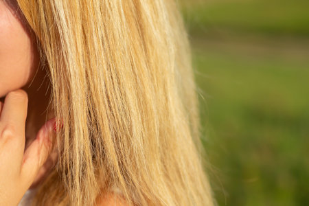 blonde woman hair close up. Health and hair care. cropped imageの写真素材
