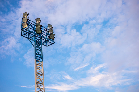 Stadium spotlight in cloudy blue skyの写真素材