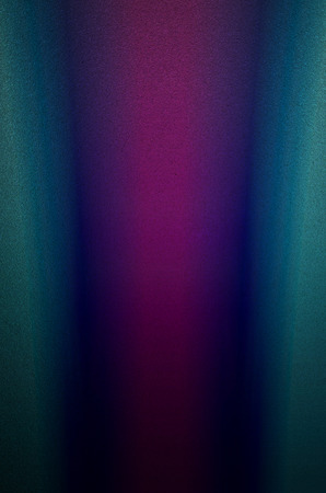 purple light shooting from bottom to top frosted glass texture as backgroundの写真素材
