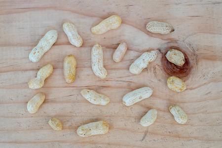 Boiled peanuts on wooden table