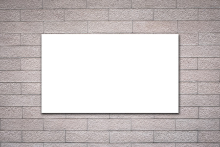 White empty billboard on brick wall for advertisement and informationの写真素材