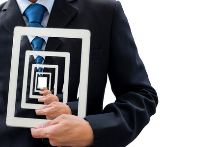 Businessman holding tablet pc. Knowledge and information from technology is unlimited.の写真素材