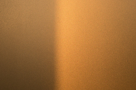 Sunlight shining through frosted glass window for backgroundの写真素材