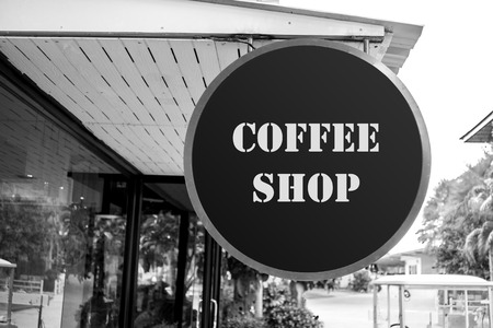 Coffee shop, coffee cafe sign board in front of the shop. Black and white filterの写真素材