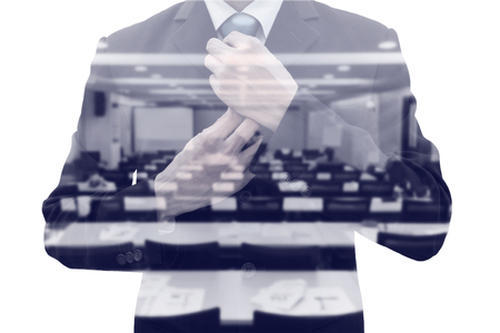 Double exposure businessman rearranging  his neck tie and conference meeting room. Preparing to speak on the stage as a lecturer. Wining his fear and shyness before time.の写真素材