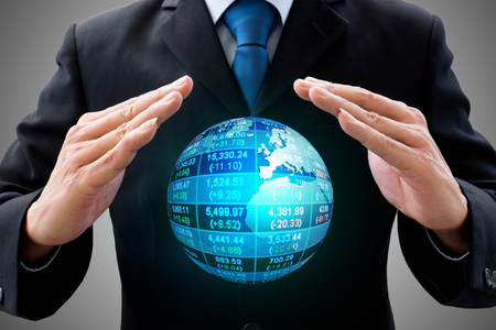 Businessman in dark gray suit and the power of global business world.の写真素材