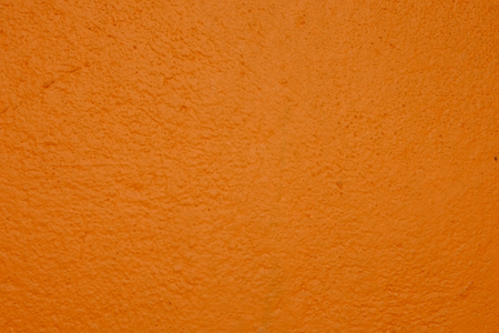 Brick colored concrete wall texture as background. Construction background.の写真素材