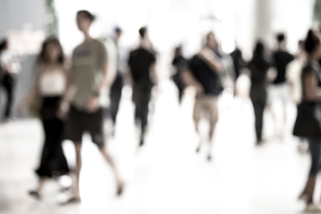 Abstract blur people walking in big fashion mall. Urban life.
