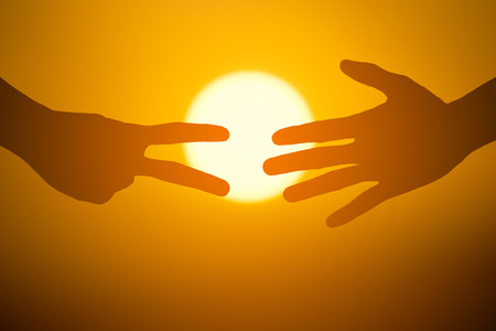 Silhouette hands playing rock, paper and scissors. Business competition concept.の写真素材