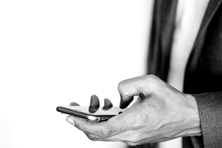 Businessman using smartphone. Modern business communication and connection concept.の写真素材