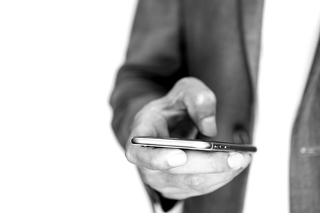 Businessman using smartphone. Modern business communication and connection concept.の写真素材