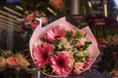 Beautiful Bouquet. Spring flowers in the cold dark room of the flower shop