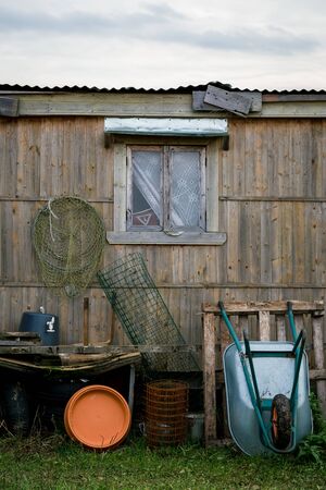 Barn, paddock, house in a pen in the stable on a farm. Raising cattle on a ranch, pastureの写真素材