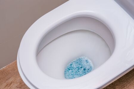 Clean toilet with cleaning agent. The concept of the home cleaning, cleaning serviceの写真素材