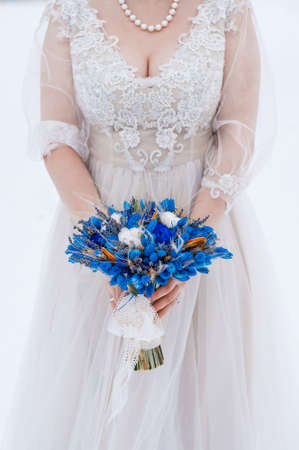 Beautiful Bridal blue bouquet. The concept of wedding, traditionsの写真素材