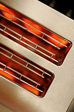 red hot toaster turned on の写真素材