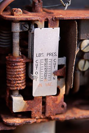 antique pressure measuring device