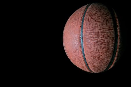 leather basketball on a black background with copyspaceの写真素材