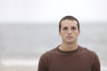 one young man close up face portraitの写真素材