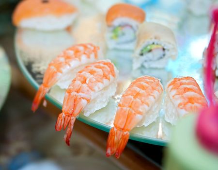 many cooked shrimp on a fancy catered plateの写真素材