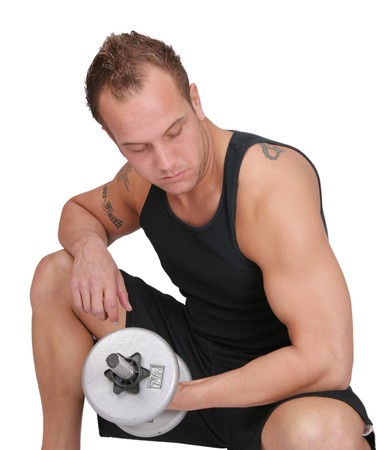 one fit muscular adult caucasian man lifting weights over whiteの写真素材